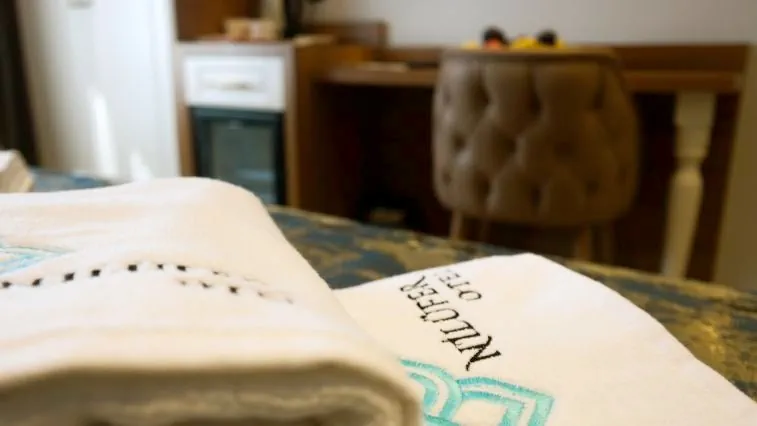 Nilüfer Otel logosu işlenmiş temiz ve hijyenik oda havluları