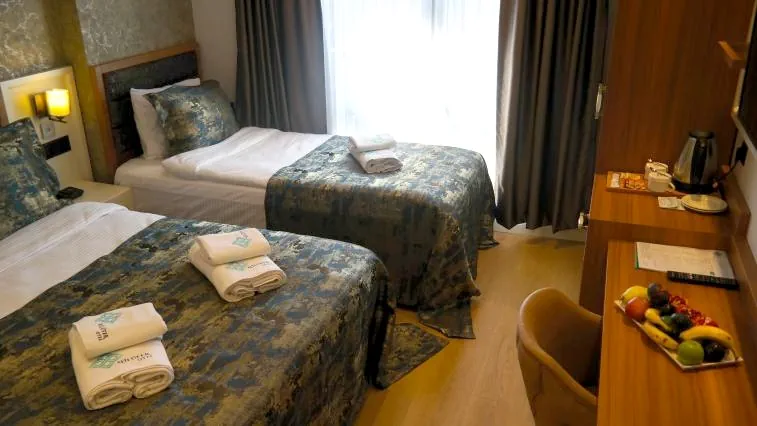 Nilüfer Otel 3 kişilik triple oda genel görünümü
